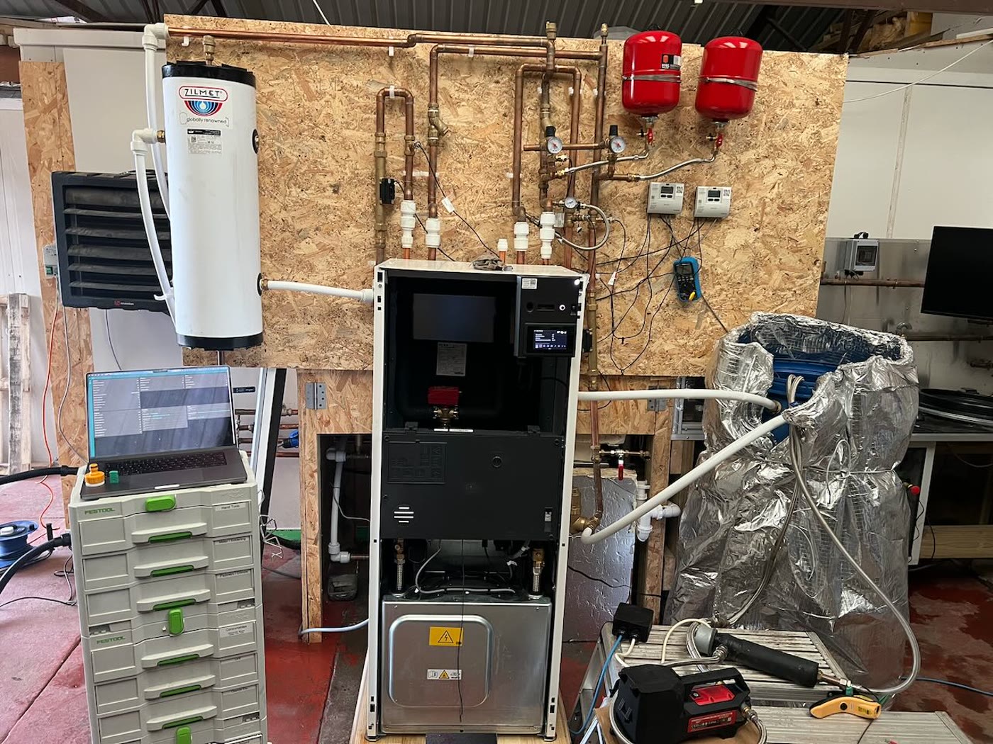 Workshop heat pump test rig with pipework and instrumentation